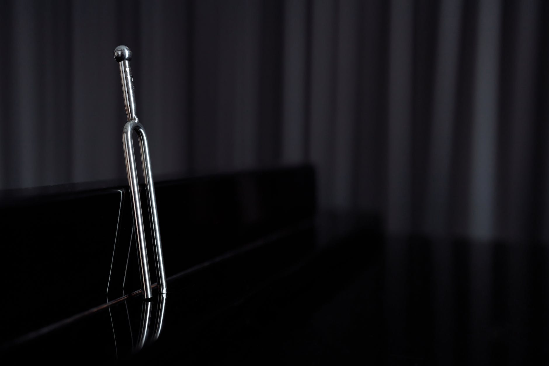 close up photo of a tuning fork